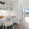a kitchen with a dining table