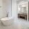 a bathroom with a tub and sink