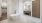 a bathroom with a tub and sink